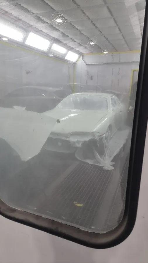 Silvia masked and primed in the spray booth