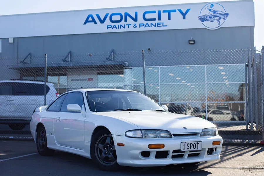Finished Silvia at the Avon City Paint & Panel building, front three-quarter