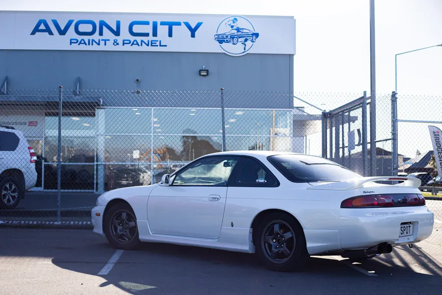 Finished Silvia at the Avon City Paint & Panel building, rear three-quarter